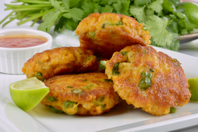 Thai A plate of Thai Fish Cakes made with red curry paste.