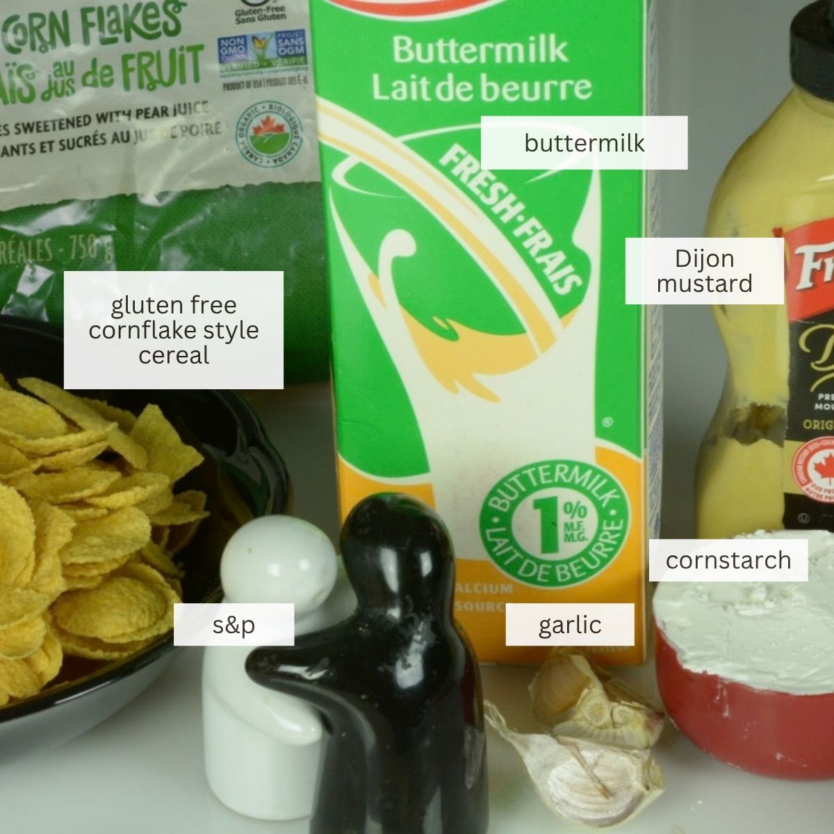 Buttermilk, Dijon mustard, cornflakes and cornstarch to make breaded pork chops.
