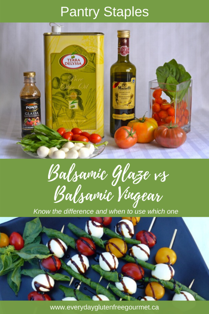 An olive oil can and bottles of balsamic glaze and balsamic vinegar surrounded by cherry tomatoes, bocconcini and fresh basil.