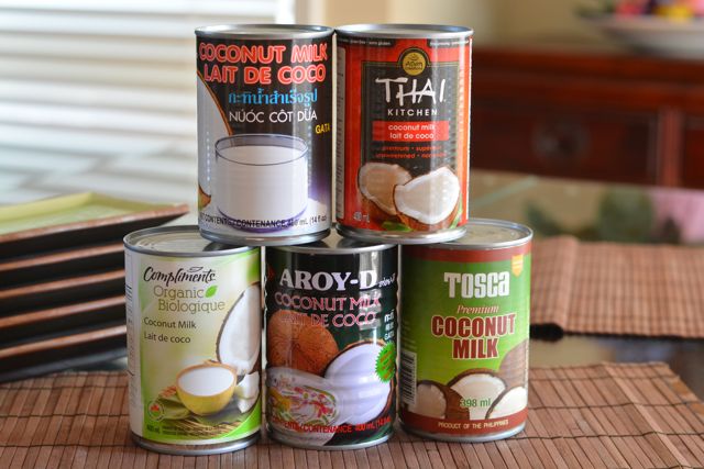 Five different cans of Coconut Milk.