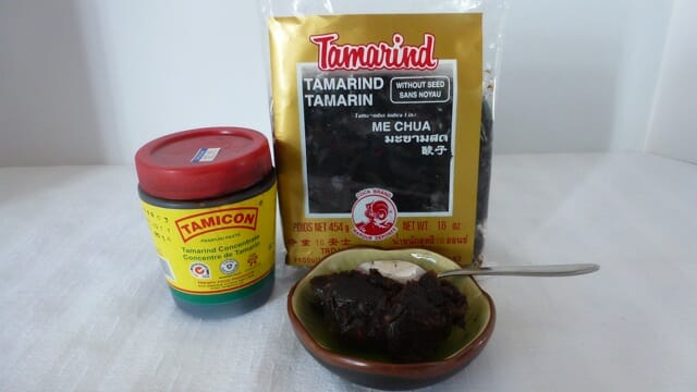 Tamarind concentrate vs tamarind paste, both forms of tamarind as you would buy them at any Asian supermarket.