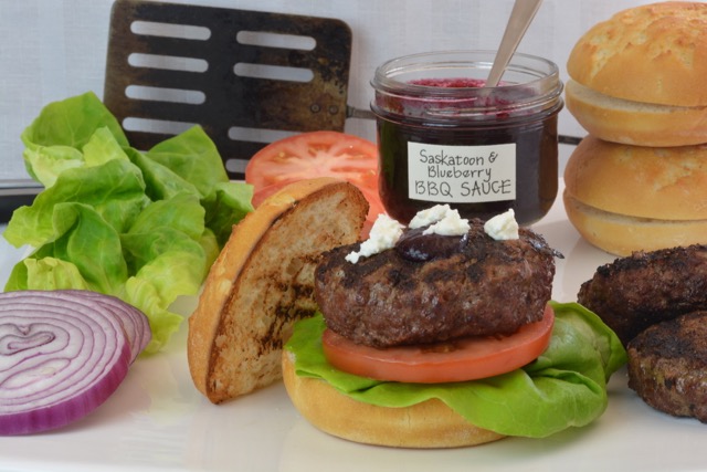 Bison Burgers with Saskatoon Blueberry Barbecue Sauce right off the grill