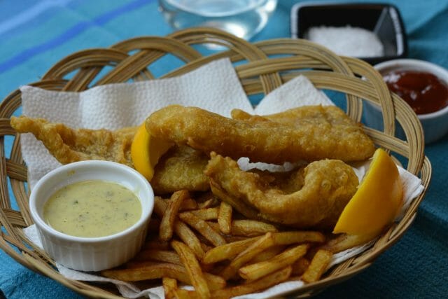 Gluten free Battered Fish and Chips served in a basket.