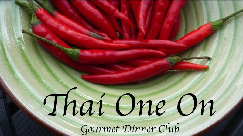 A green bowl filled with fiery Thai chiles, Thai One On - a menu
