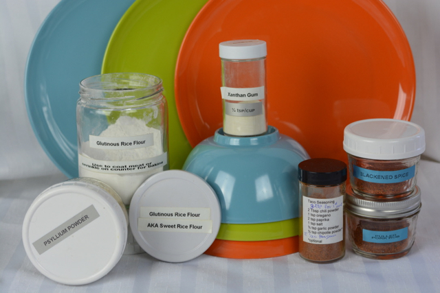 Organize for success with labeling. A variety of jars with labels that include two names for an ingredient, the amount needed, and even a recipe to use it.