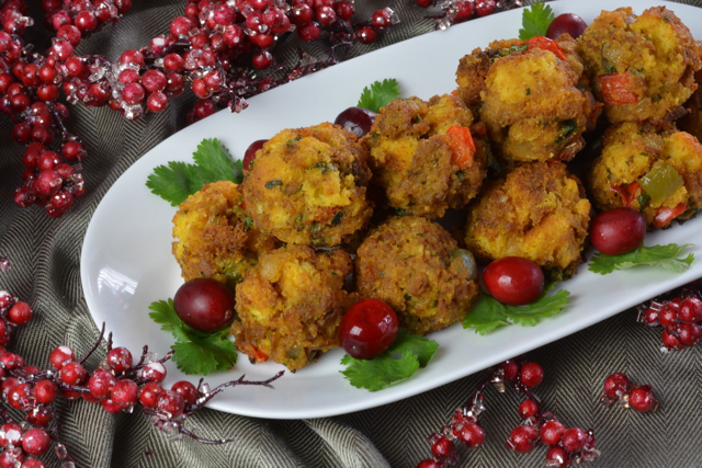 A plate piled with Cornbread Sausage Stuffing Balls