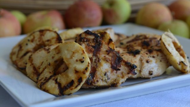 A platter of Grilled Mustard Chicken with Apple Rings, a perfect fall recipe.