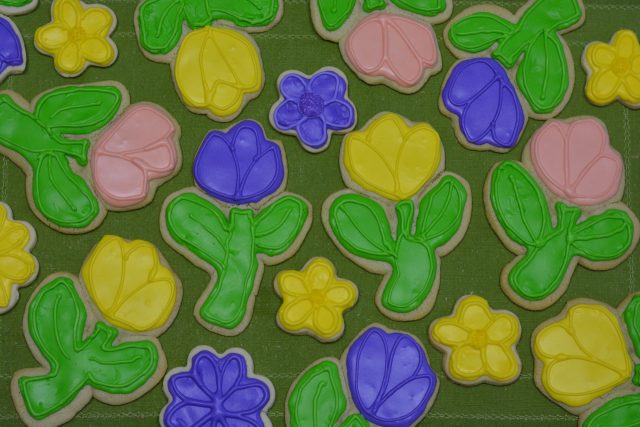 Colourful sugar cookies decorated with royal icing