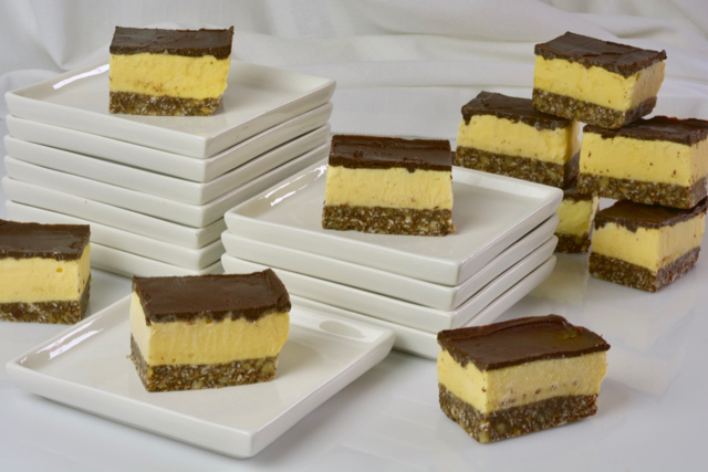 Nanaimo Ice Cream Bars being served on small white plates