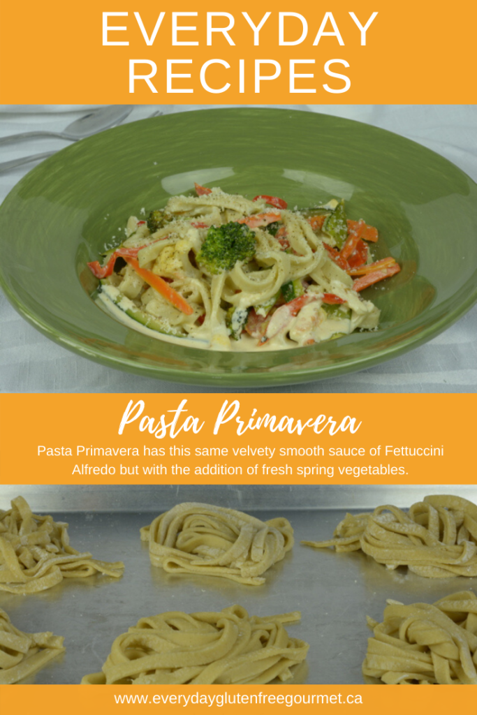a green plate of Pasta Primavera and a tray with swirls of fresh homemade pasta.