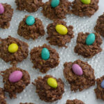 Uncooked Dainties with a coloured m&m Easter eggs on top.