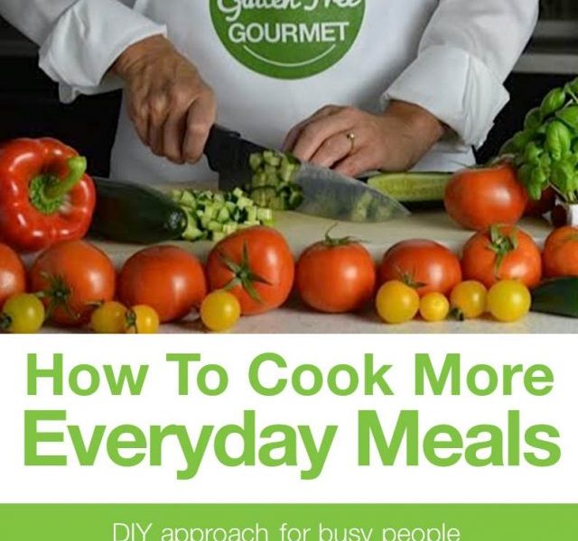 ebook cover page of someone chopping cucumber on a cutting board surrounded by tomatoes.