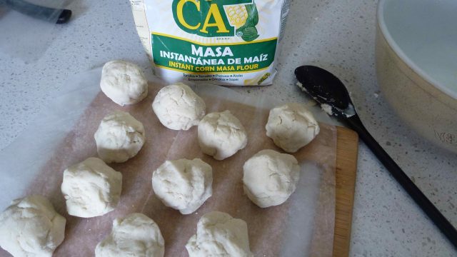 Balls of Gluten Free Masa Harina to be pressed into tortillas.