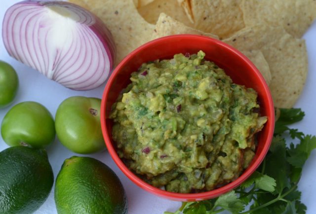 A bowl of homemade, tomatillo guacamole.