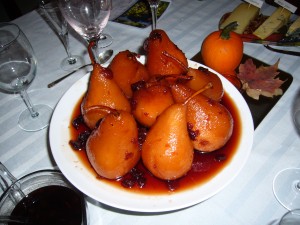 Pears Poached in Port with Cranberries with a selection of cheeses.