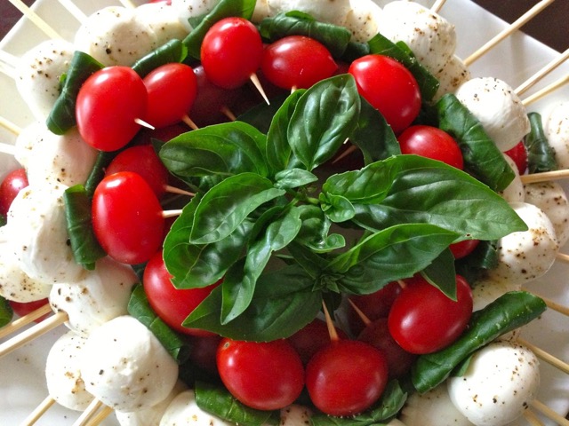 A Holiday Appetizer - Tomato Bocconcini wreath with fresh basil