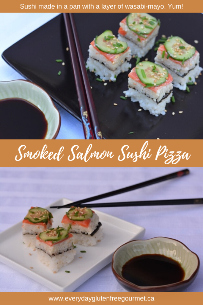 Squares of Smoked Salmon Sushi Pizza topped with sliced cucumber and sprinkled with sesame seeds.