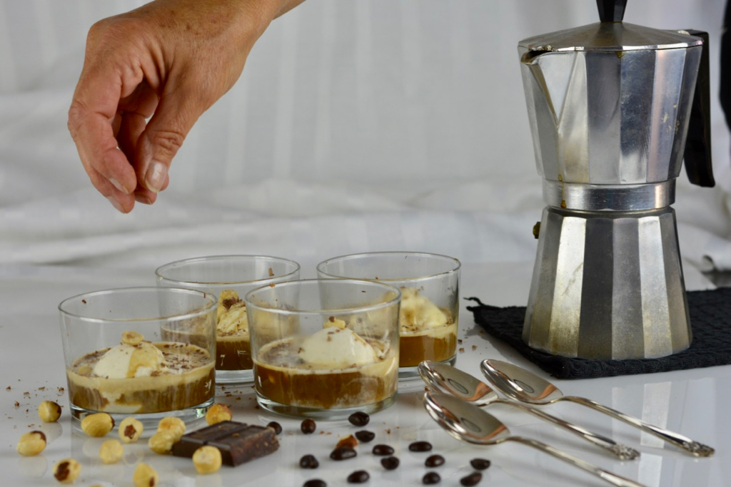 Italian Affogato is simply espresso poured over coffee, add grated chocolate and hazelnuts for good measure.