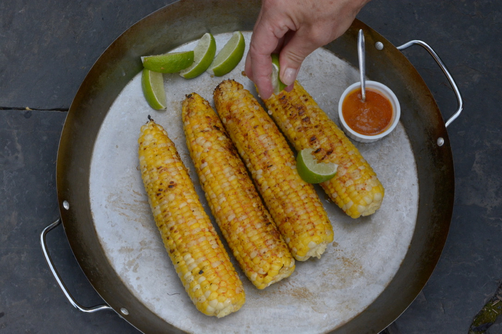 Grilled Corn on the cob with chipotle butter and fresh lime.
