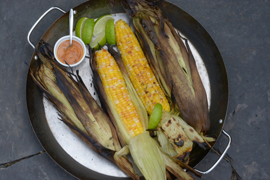 Grilled Corn on the cob with chipotle butter and fresh lime.