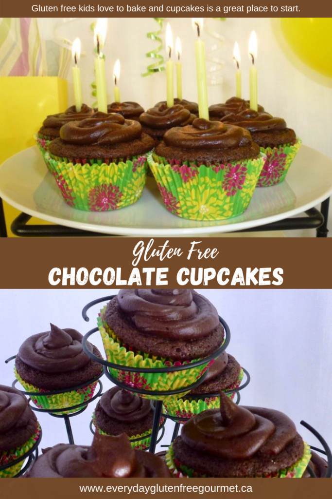 Chocolate Cupcakes with chocolate icing and yellow candles for a birthday.