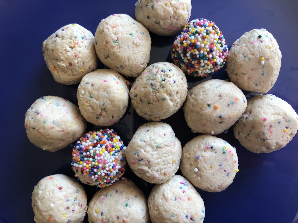 Gluten free Edible Cookie Dough Balls covered in rainbow sprinkles are fun for kids and can be made dairy free.