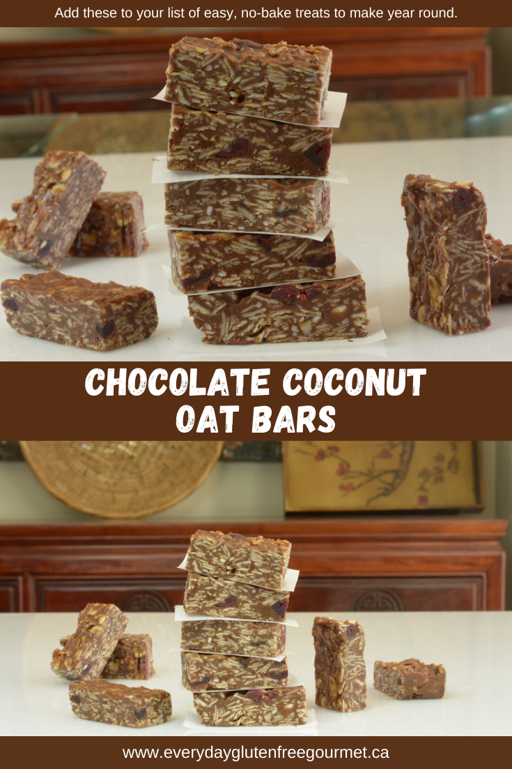 Chocolate Coconut Oat Bars stacked with paper between them ready to enjoy.