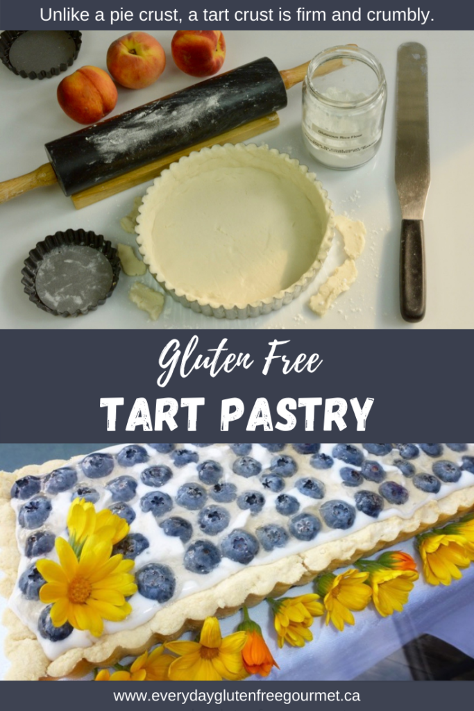 Raw pastry shell in a tart pan and a finished dessert tart filled with vanilla cream, topped with blueberries and decorated with calendula blossoms.