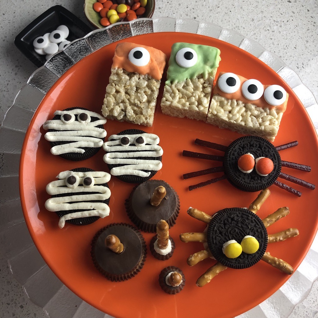 gluten free homemade Halloween treats; Rice Krispie monsters, cookie spiders, Oreo mummies and witch's broomsticks.