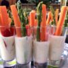 Vegetable Shooters with dip become a holiday appetizer with red and green vegetables.