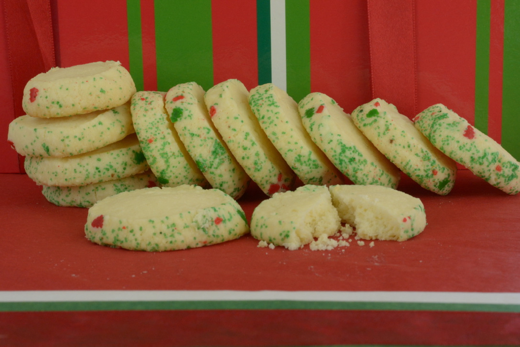 Rolled Shortbread with holiday sprinkles on a Christmas box