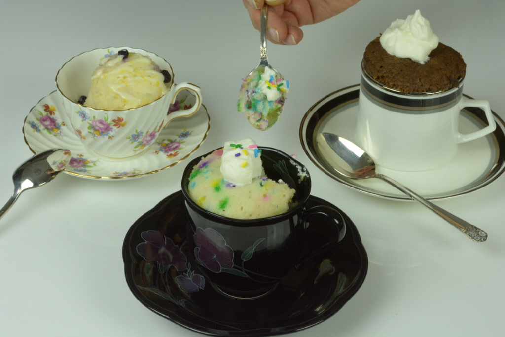 Three different gluten free mug cakes.