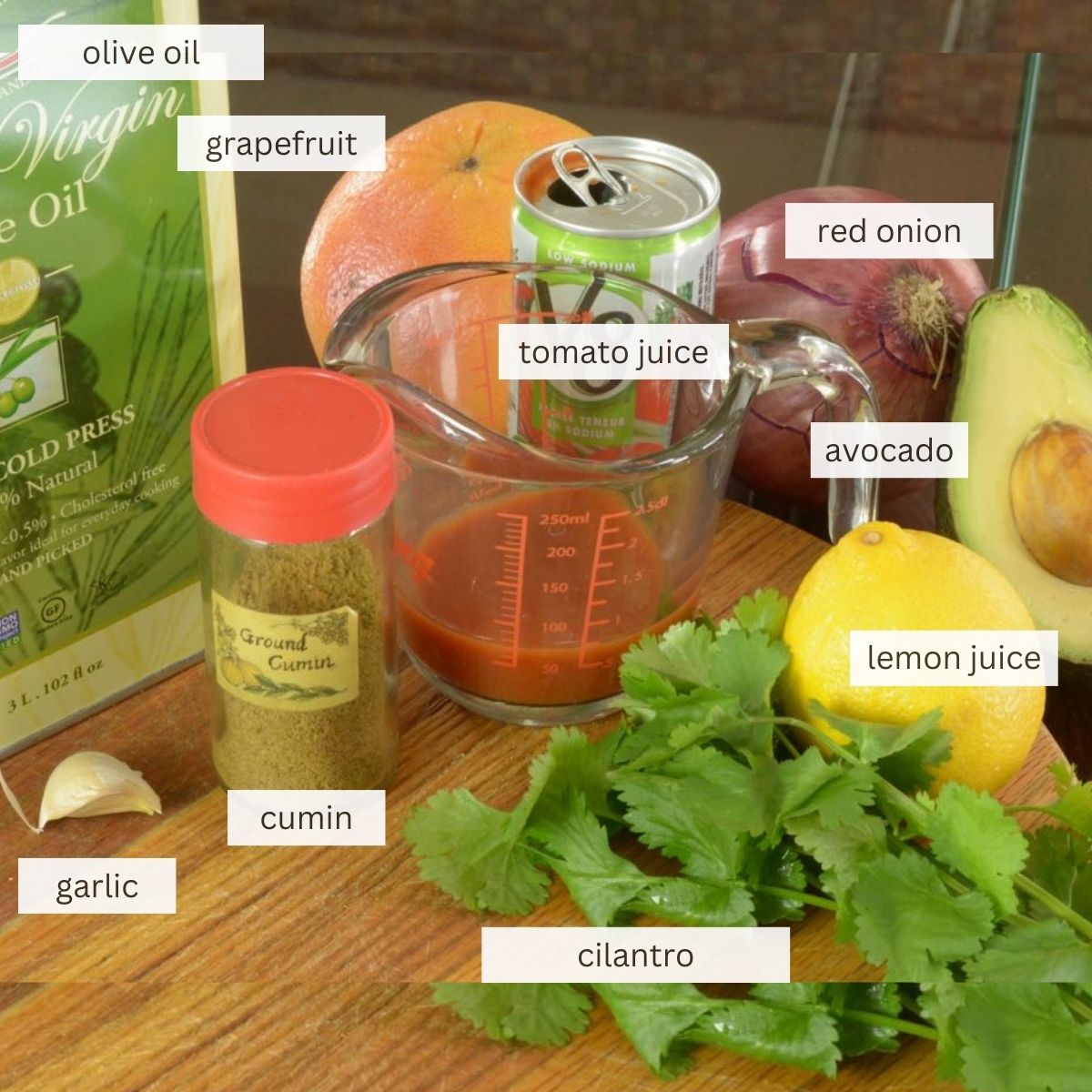 The ingredients to make Grapefruit Avocado Salad and Tomato Cumin dressing.