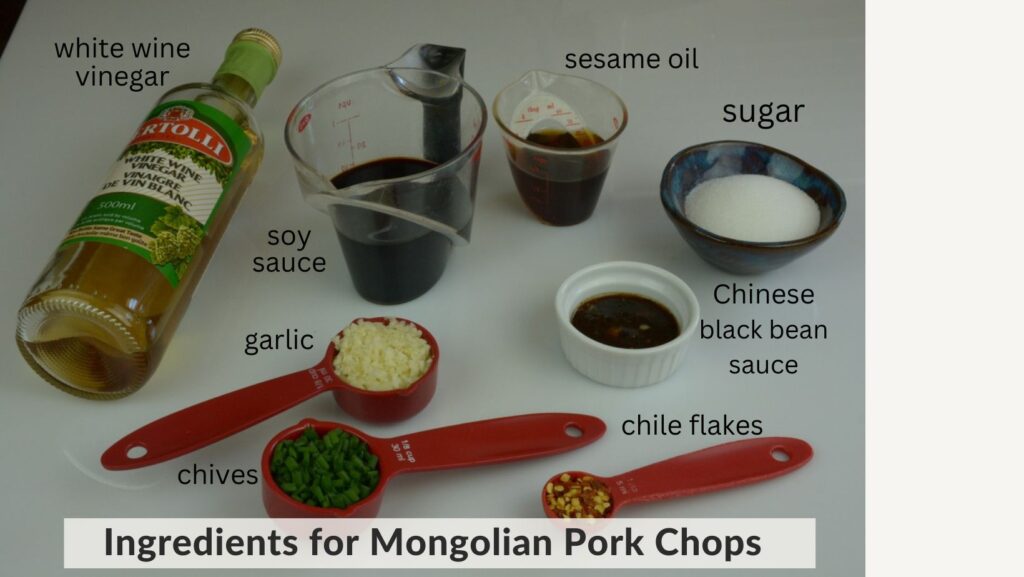 Measuring cups and spoons with all the ingredients for Mongolian Pork Chops