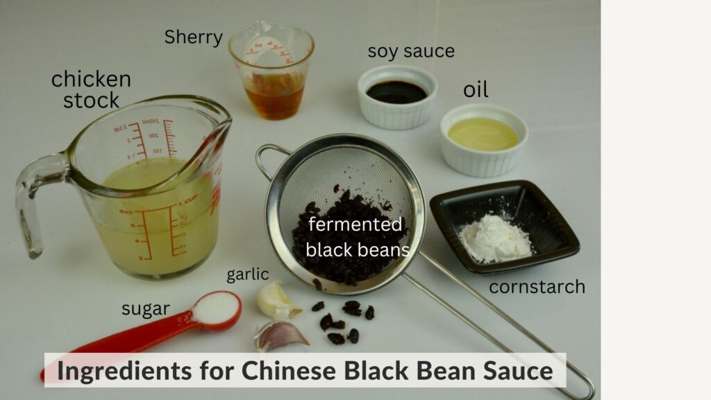 Measuring spoons and cups with all the ingredients to make Chinese Black Bean Sauce