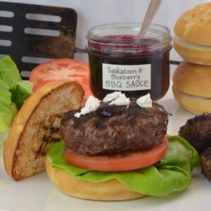 Bison Burgers with Saskatoon Blueberry Barbecue Sauce right off the grill