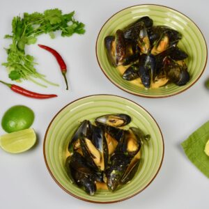 Thai Coconut Mussels with red curry paste and cilantro