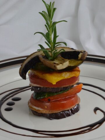 Vegetable Stacks with a balsamic glaze swirl.