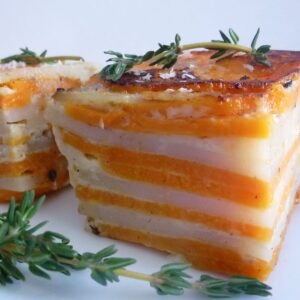 Square pieces of Scalloped White and Sweet Potatoes