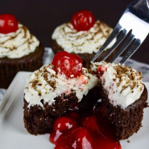 A pedestal tray displaying Black Forest Cupcakes