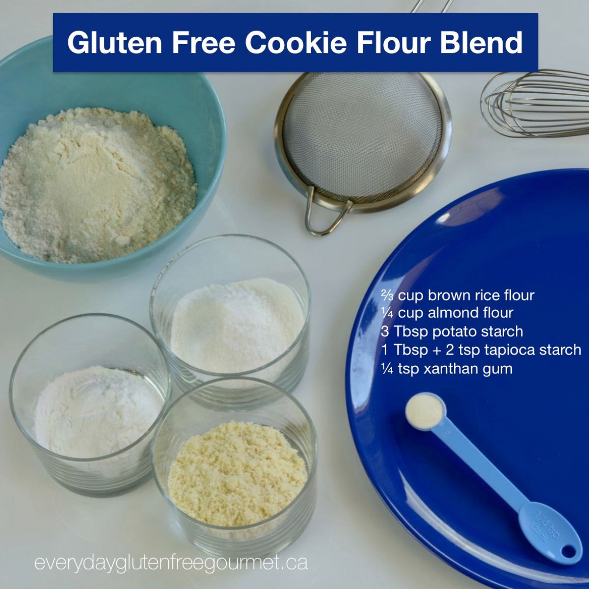 A blue plate with with the recipe in white letters, surrounded by a strainer and 4 bowls with the cookie flour ingredients.