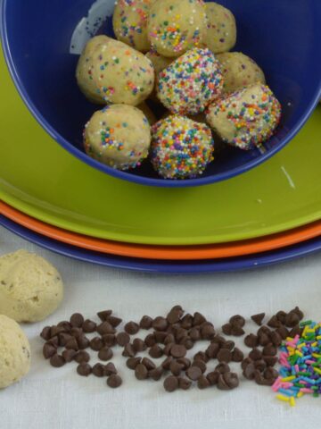 Gluten free Edible Cookie Dough Balls covered in rainbow sprinkles are fun for kids and can be made dairy free.