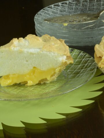 A piece of gluten free Lemon Meringue Pie cut and ready to eat.