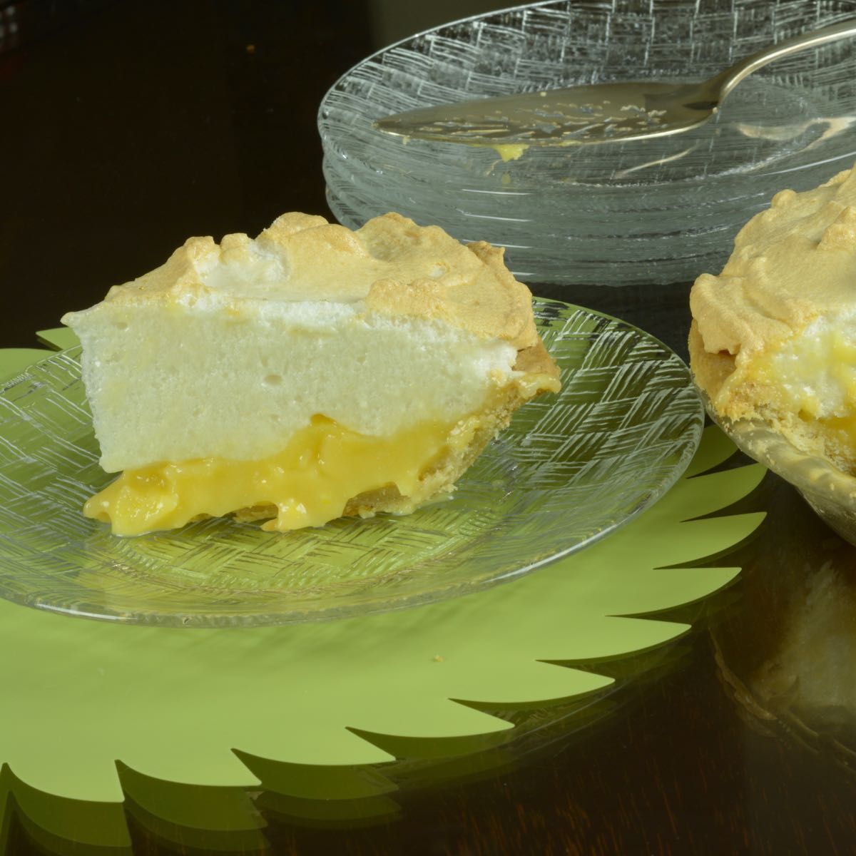A piece of gluten free Lemon Meringue Pie cut and ready to serve.