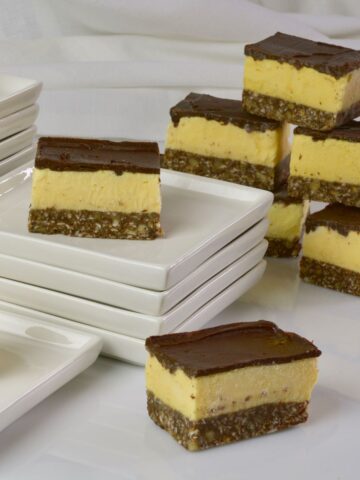 Nanaimo Ice Cream Bars being served on small white plates