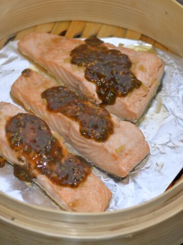 Three pieces of Salmon with Chinese Pesto.