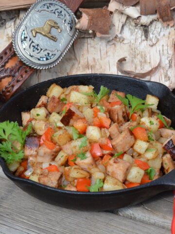Sausage Breakfast Hash in a cast iron skillet.