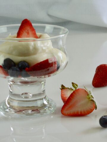 Gluten free Vanilla Cream with fresh fruit served in a variety of glassware.