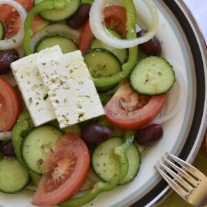 A plate of the classic Greek Summer Salad combo