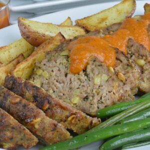 Italian Meat Loaf with Pine Nuts served with homemade tomato sauce.